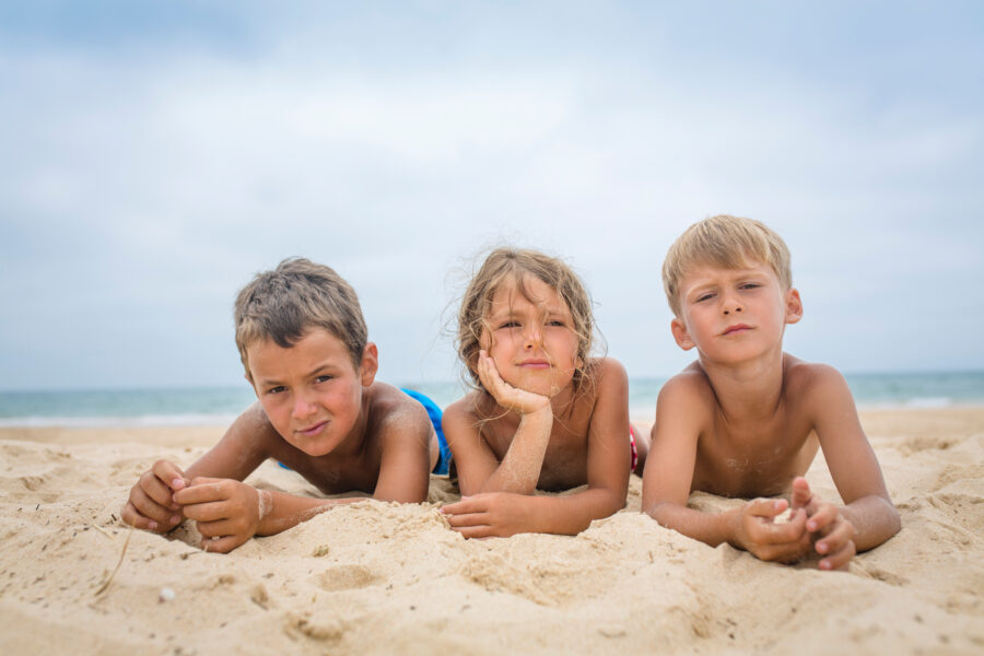 Bored Children At The Beach